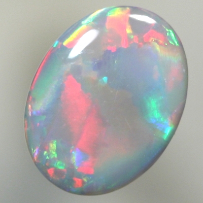SOLID SEMI BLACK OPAL Rolling flashes of red and green turquoise 